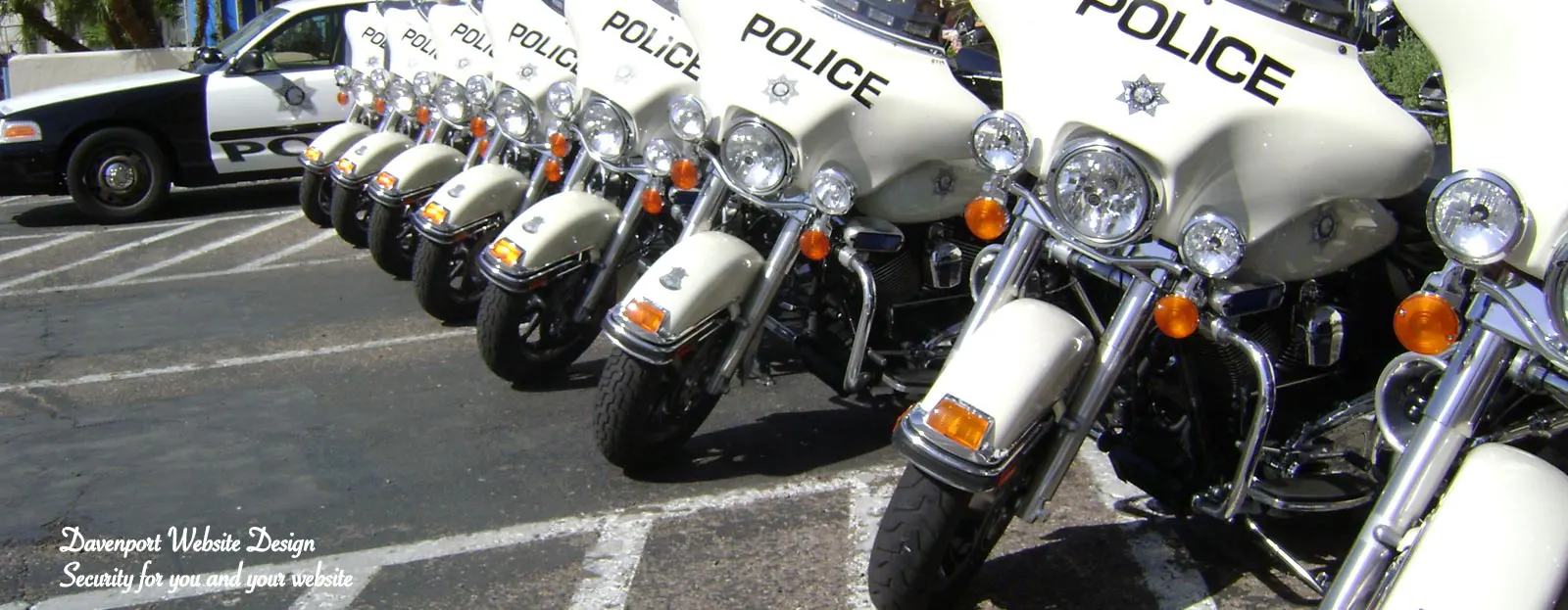 Row of Police Motorcycles at a Santa Cruz Car Show.